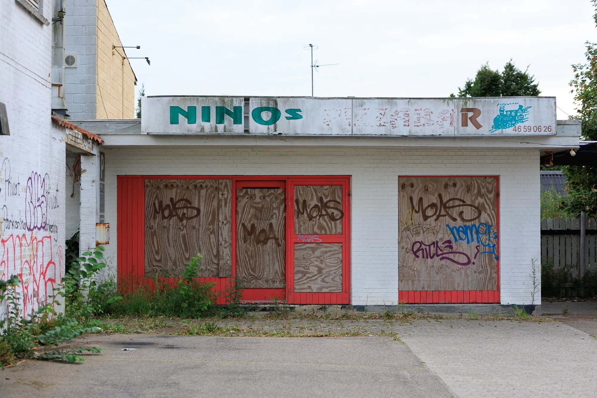 Back-of-house lane with signage