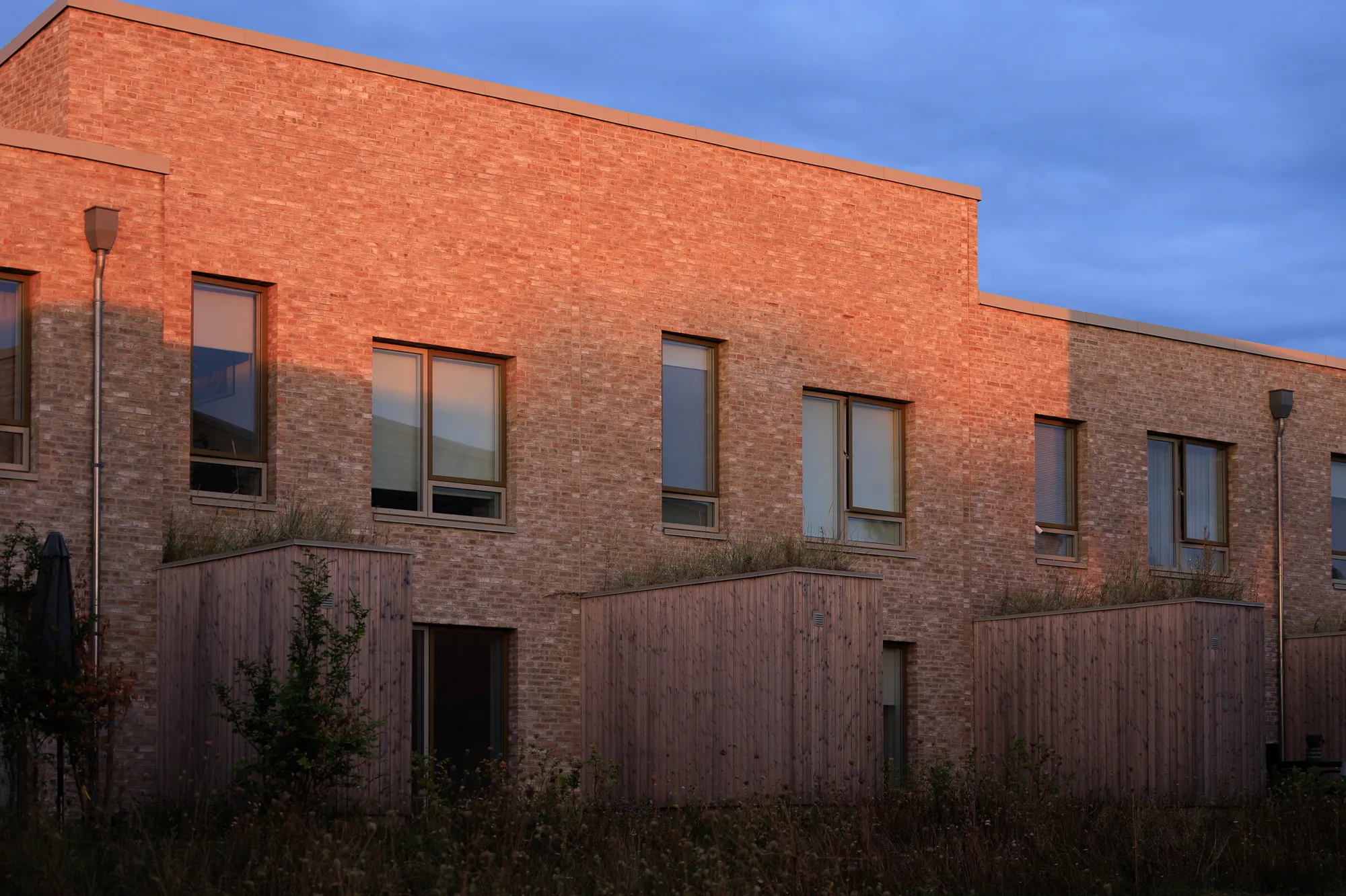 Blue-night tones along residential façades — Hedehusene