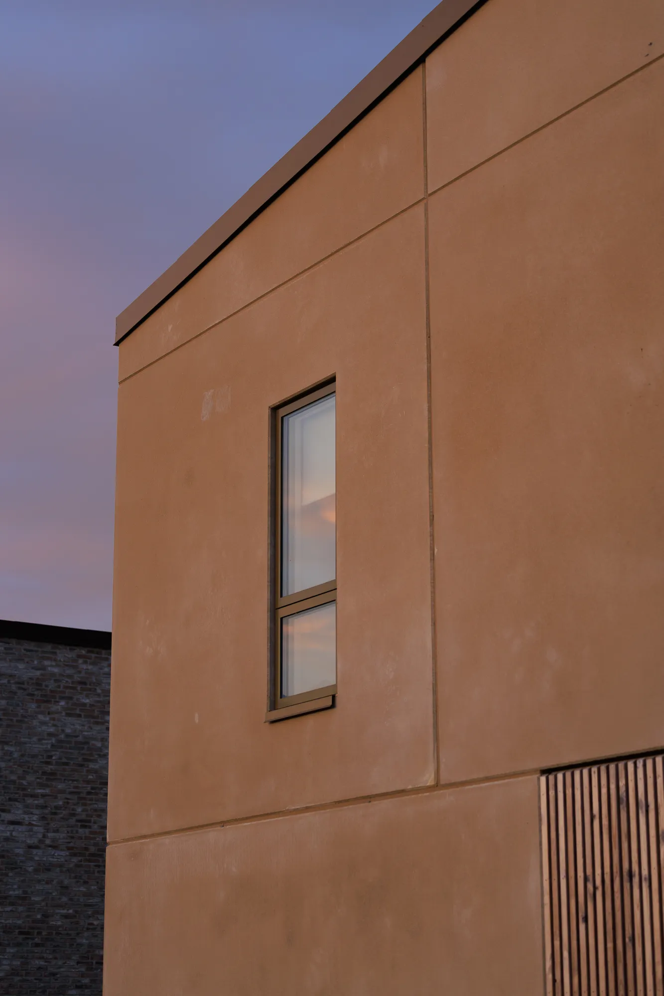 Railway meets new housing — night scene